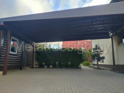 Авто навес для частного дома с фальшь бортом